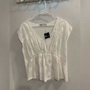 Elegant White Embroidered Blouse